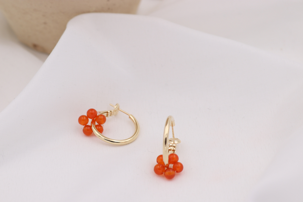 bloom earrings orange bodegon