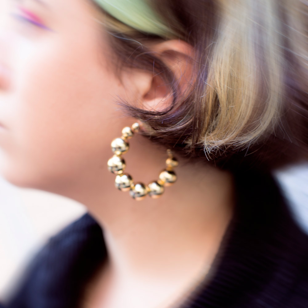 Milkyway Earrings Model blurry