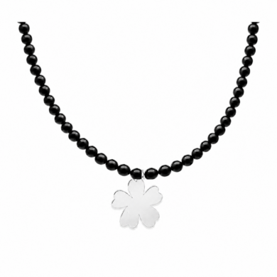 Detail of black onyx beads and silver Fleur flower pendant
